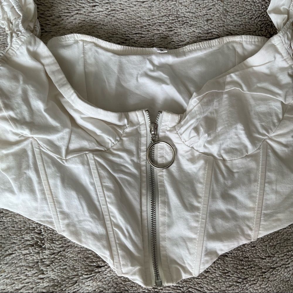Bustier top with circle zipper